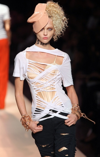 Illustration for article titled Jean-Paul Gaultier: Brights, Bras, Bellies, And Braids